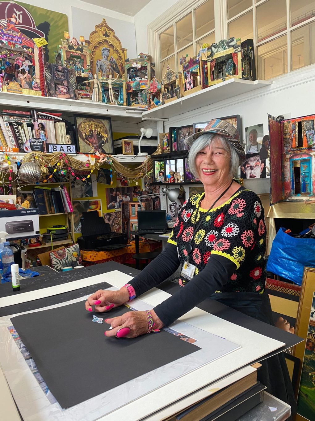 Artist Jennie Cave in her busy artist studio at The Island
